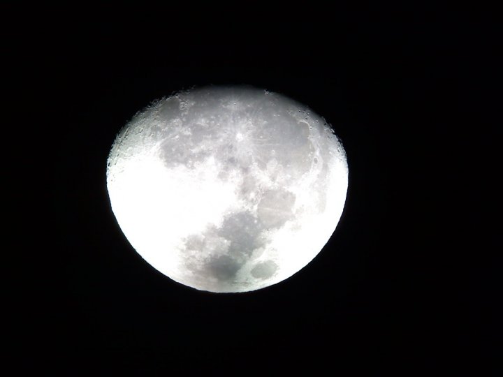 View of the moon through a 10